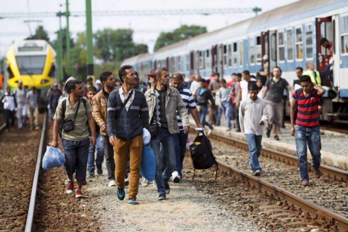 hungary_migrants-7151b6669f4f41f081659844a95268ba.jpg